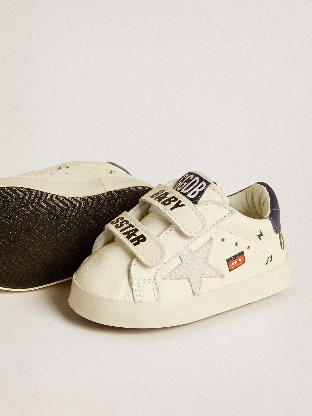 Baby School in nappa leather with musical print and white suede star